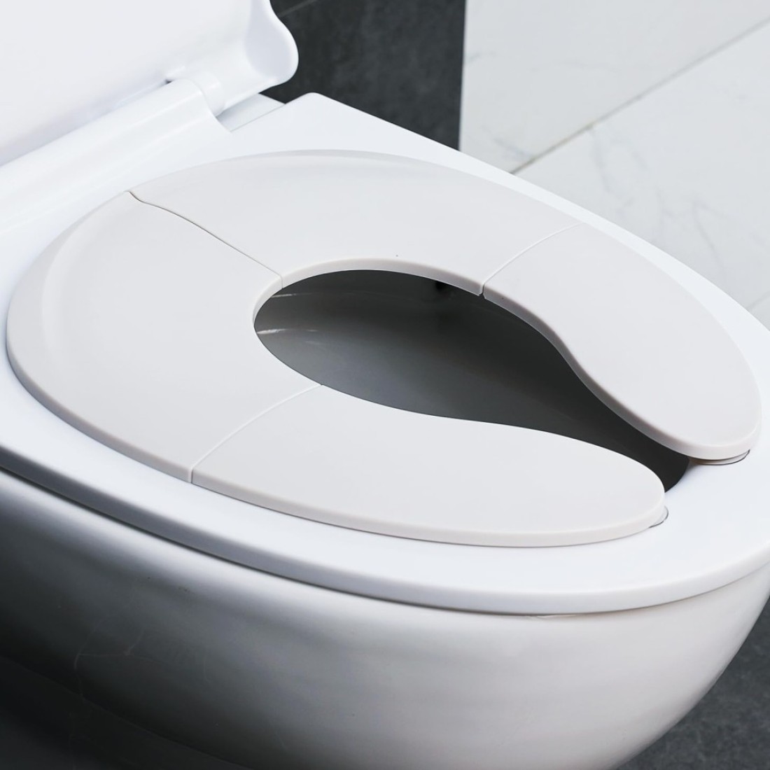 Funbliss Portable Potty Training Seat Foldable &amp; Secure Toilet Seat for Toddlers Travel Friendly Design Non Slip Suction Cups Anti Pinch Pads Grey