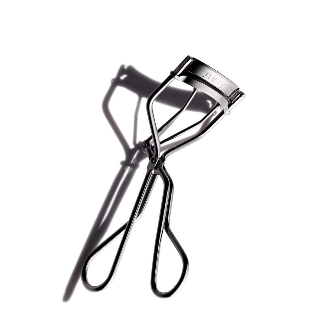 ShiseidoEyelash Curler Crimps Curls Lashes for Perfect EyeFraming Fringe Gentle Safe Includes Replacement Pad