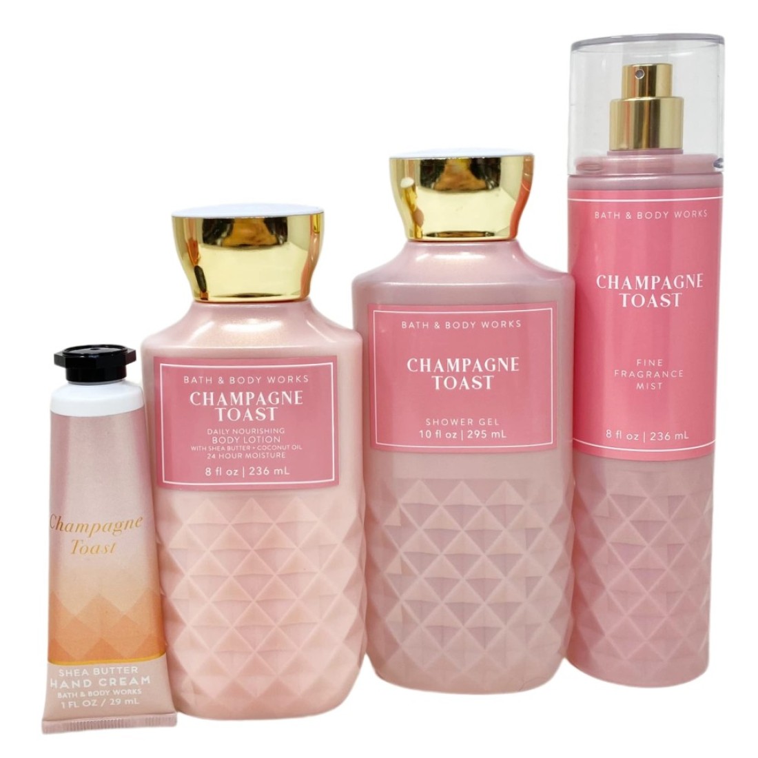 Bath and Body Works CHAMPAGNE TOAST Gift Bag Set Body lotion Shower Gel and Fine Fragrance Mist Plus a Shea Butter Hand Cream arranged inside a transparent gift bag