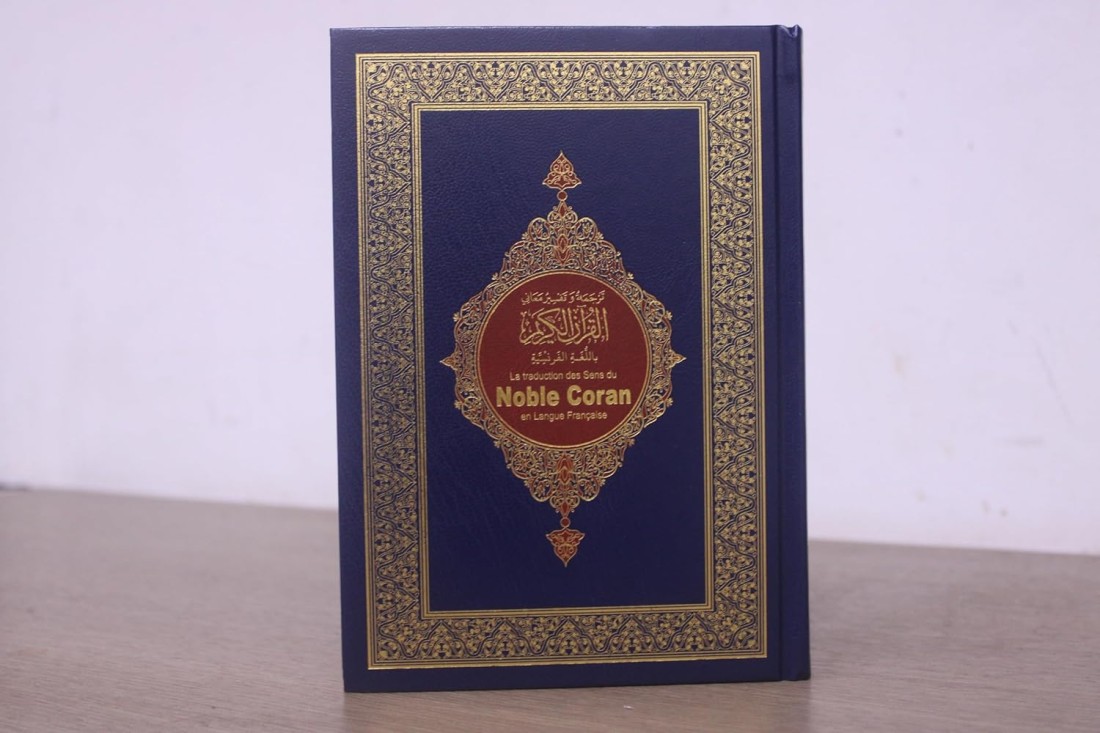 Noble Quran in French Language -printed by mohammed bin rashid holy quran printing center. La traduction des Sens du Noble Coran en langue Fran&ccedil;aise