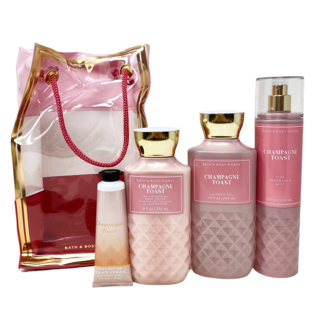 Bath and Body Works CHAMPAGNE TOAST Gift Bag Set Body lotion Shower Gel and Fine Fragrance Mist Plus a Shea Butter Hand Cream arranged inside a transparent gift bag