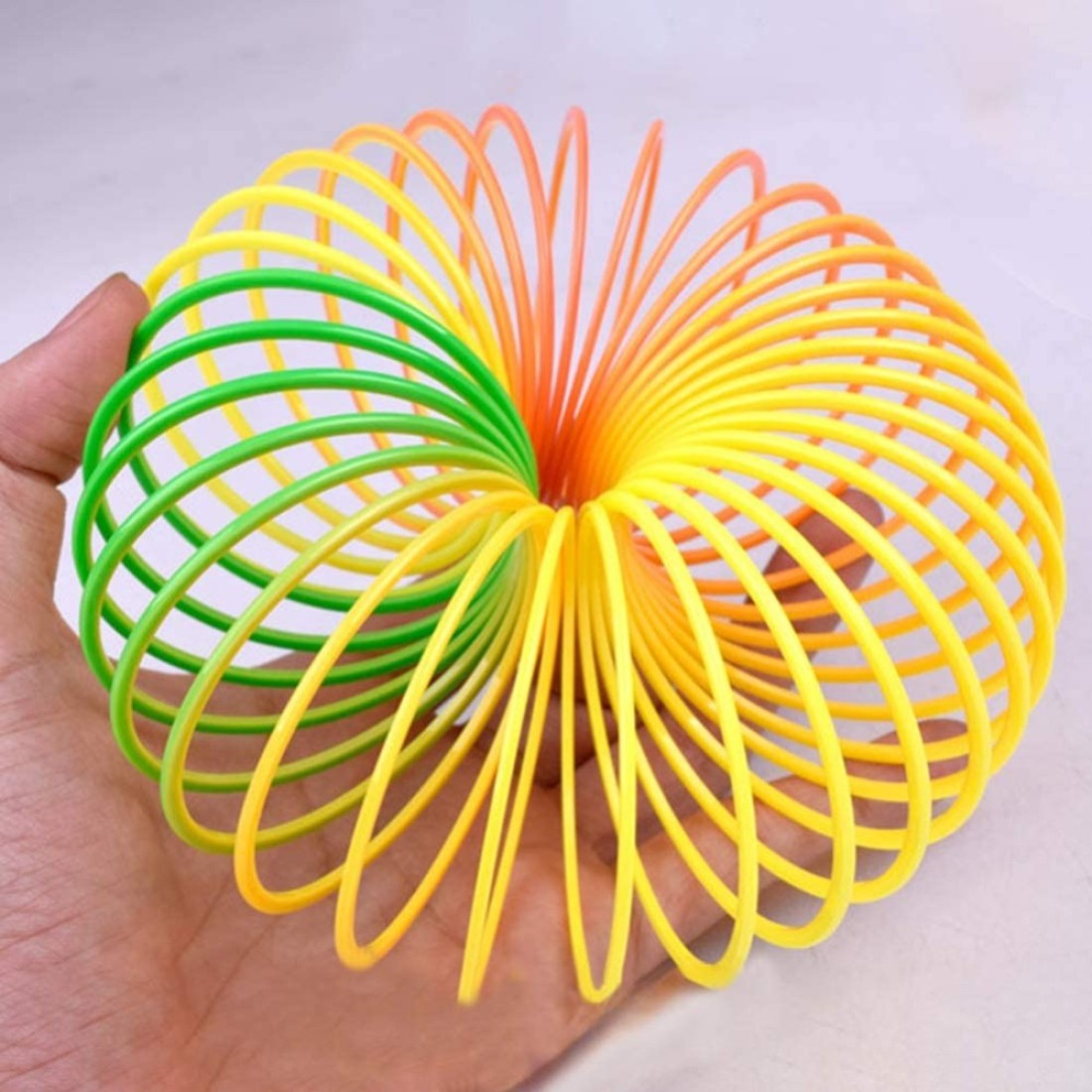 Samdone Rainbow Magic Spring, Colorful Rainbow Neon Plastic Spring Toy Party Supplies (1pc Color Random)