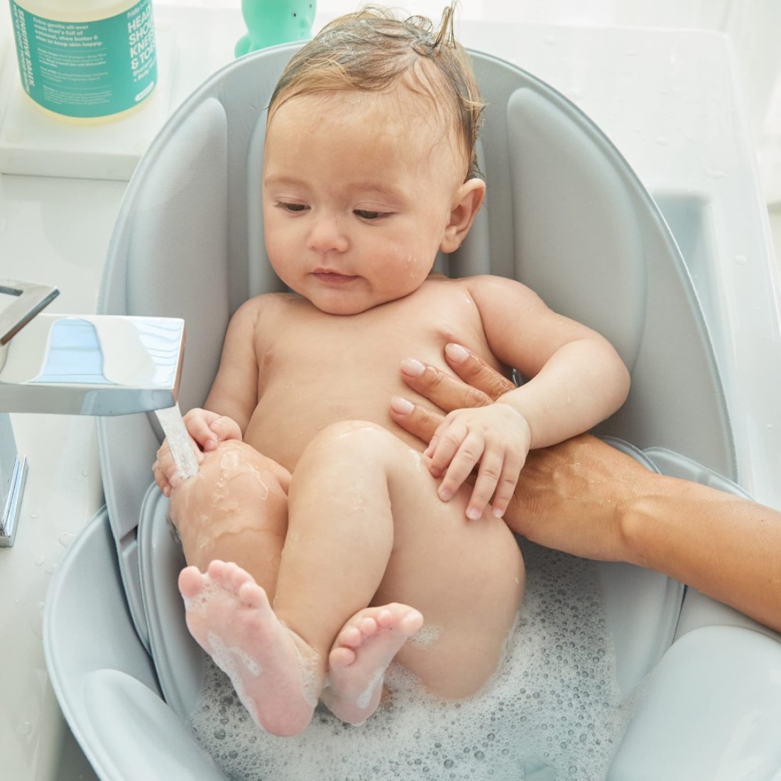 Frida Baby Soft Sink Baby Bath Seat Sink Bather for Baby Easy to Clean Baby Bathtub Bath Cushion That Supports Babys Head