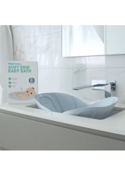 Frida Baby Soft Sink Baby Bath Seat Sink Bather for Baby Easy to Clean Baby Bathtub Bath Cushion That Supports Babys Head