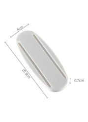 Generic Punch Free Plug Sticker Surge Protector Wall Mount Fixing Device Self Adhesive Power Plug Cable White 10.2*0.7*4cm